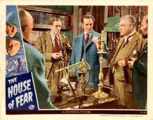 Lobby card for the movie House of Fear