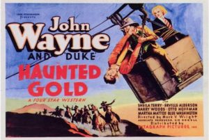 Lobby card for the movie Haunted Gold