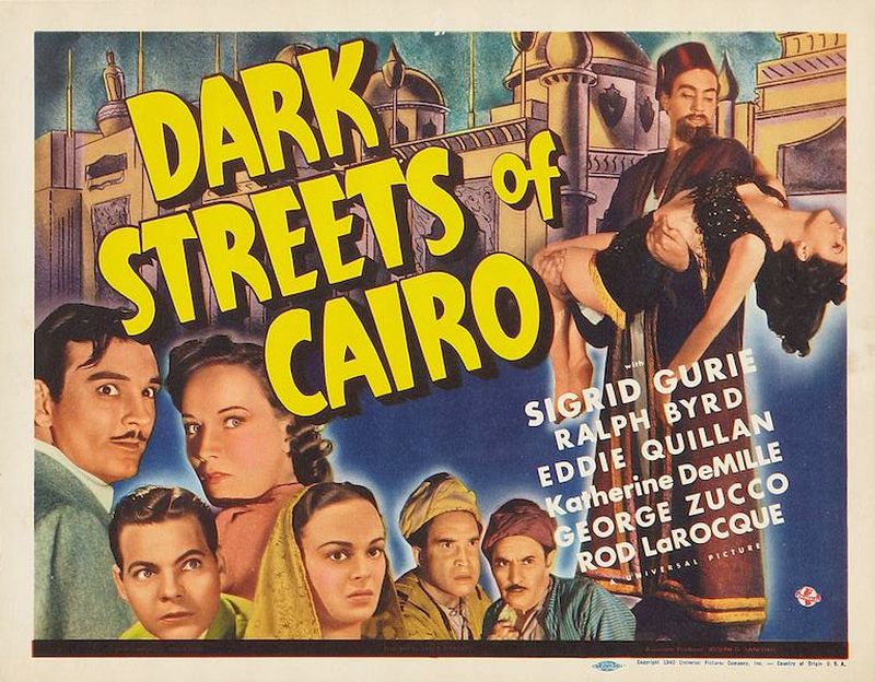 Lobby card for the movie Dark Streets of Cairo